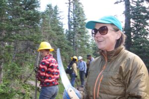 Lesley holds tools