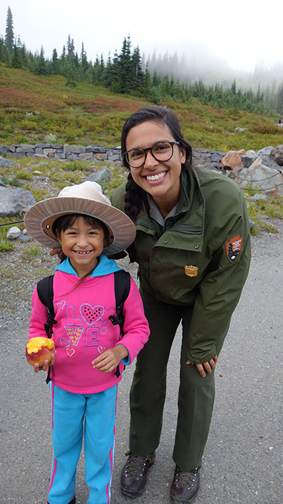 Mount Rainier ranger poses with a Casa Latina participant