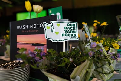 WNPF's Our Backyard Rocks sticker in a boquet