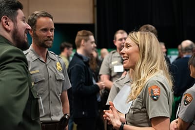 Park rangers chat at the AUction