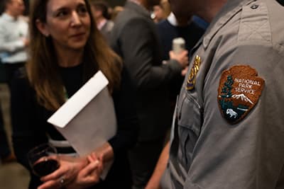 National Park Service badge on a ranger's shirt close up