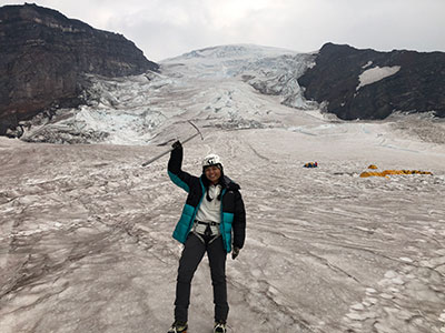 Kacee grins from high camp at Ingraham Flats