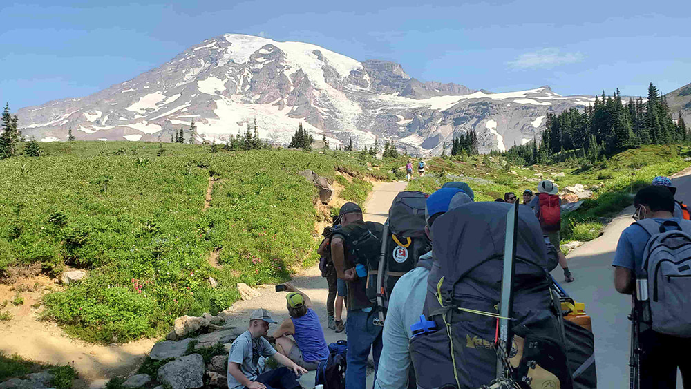 Climbers hike up the trail at Paradise