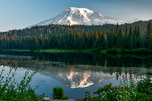 A view of Mount Rainier and its reflection