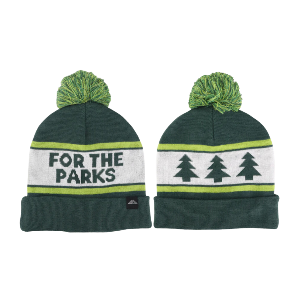 Two green beanies. The one on the left reads For The Parks and the one on the right has three evergreen tree drawings.